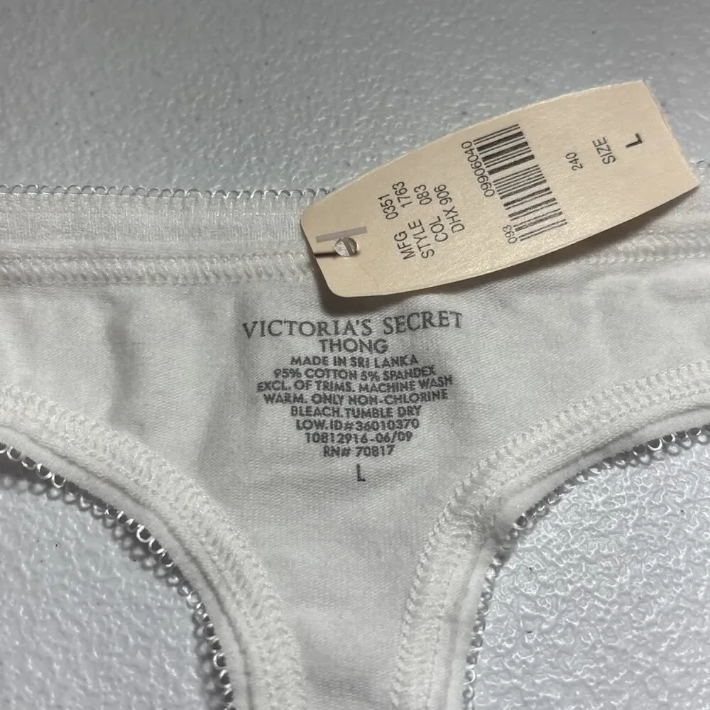 VTG. Victoria Secret white with Peacock image Thong Size LG. NEW Cotton